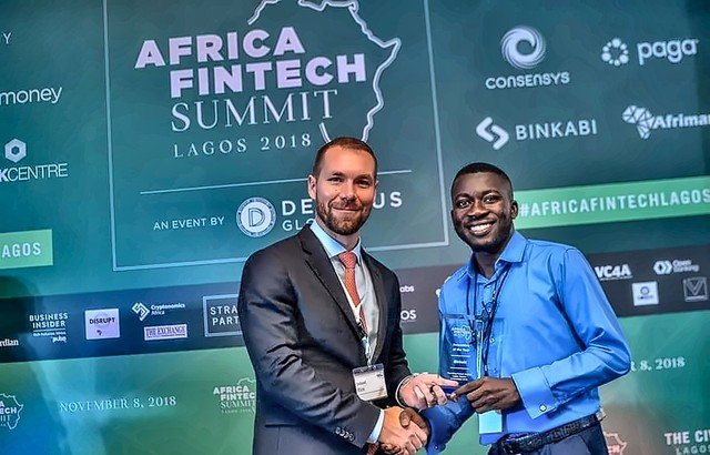 Femi Royal receiving an award at the Africa Fintech Summit, Lagos