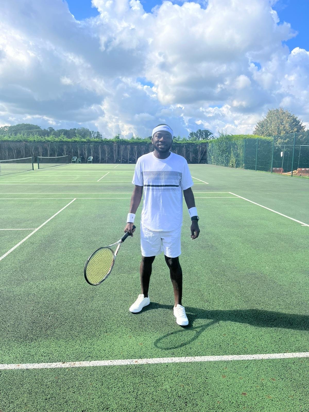 Femi Royal on a tennis court