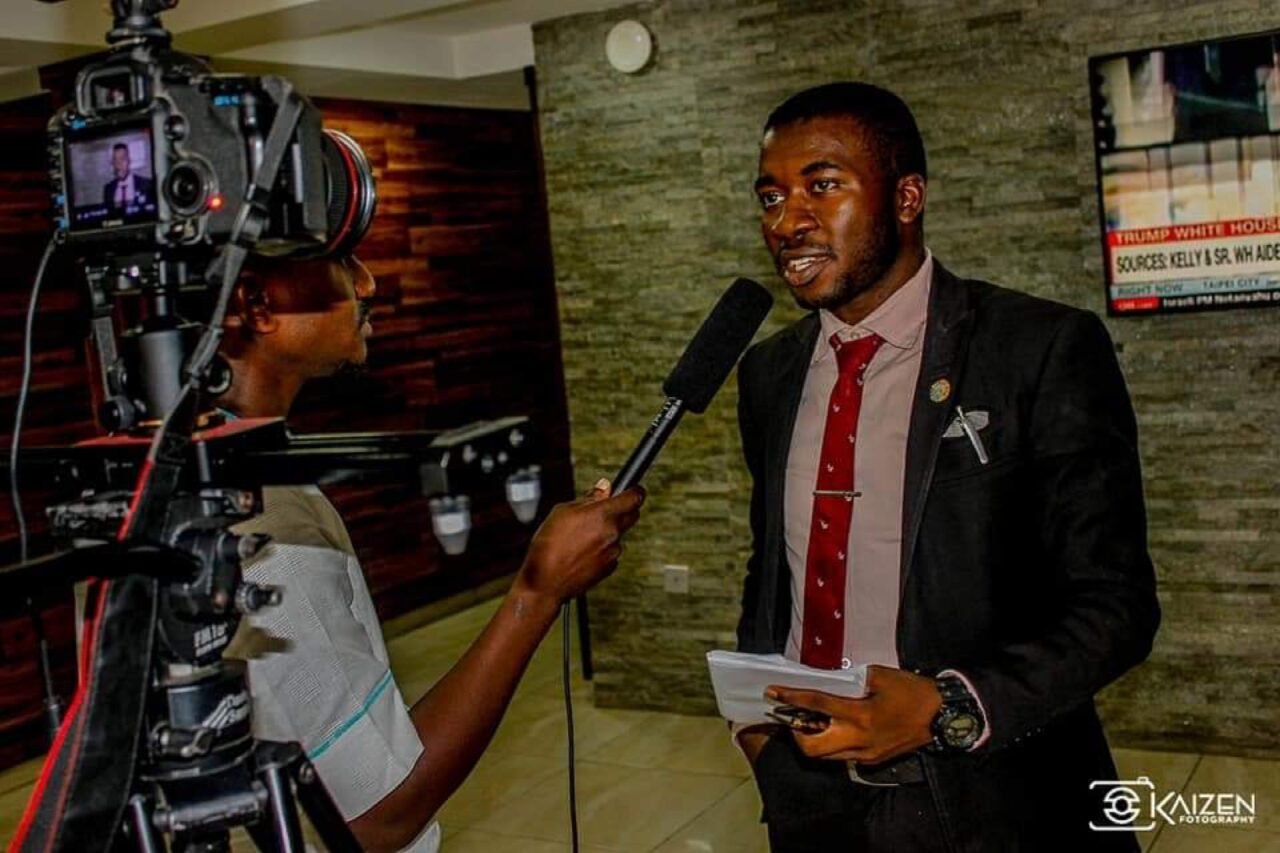 Femi Royal giving a television interview